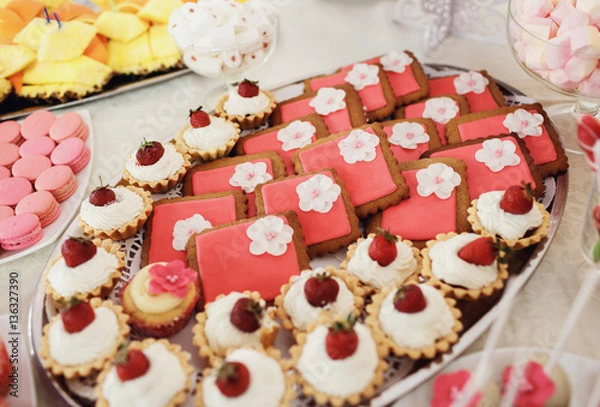 Fototapeta Sweet cakes on the buffet table
