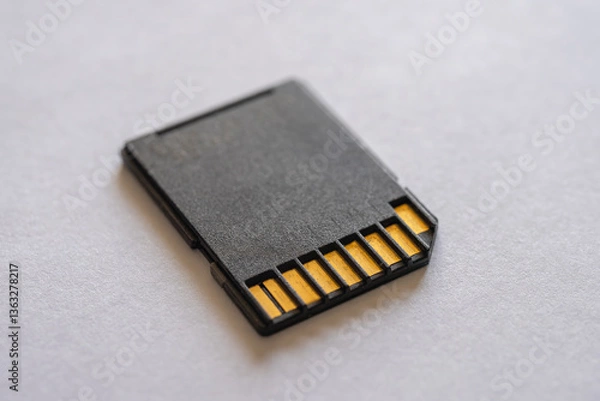 Obraz Black sd card on a white table