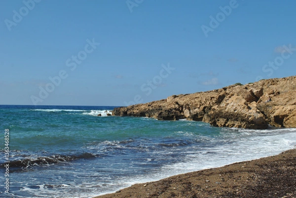 Fototapeta landscape photo, sea waves crashing against a rocky shore