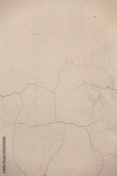 Obraz Texture beige cement wall with cracks