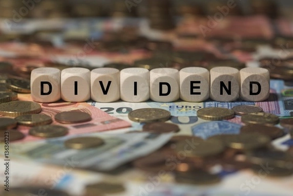 Obraz dividend - cube with letters, money sector terms - sign with wooden cubes