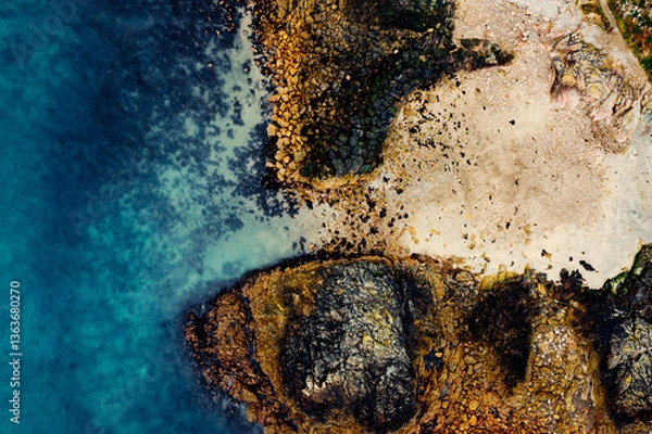 Obraz Aerial View of the Rugged Irish Coastline in Howth, Dublin – Rocky Cliffs and Blue Sea