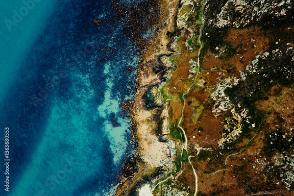 Obraz Aerial View of the Rugged Irish Coastline in Howth, Dublin – Rocky Cliffs, Blue Sea, and Lush Greenery