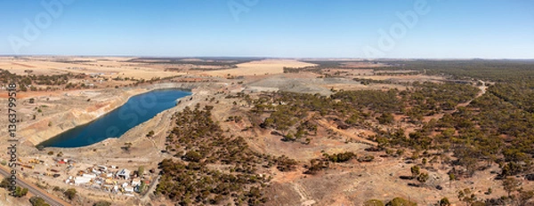Fototapeta Old abandoned mine in the outback, Water Basin and Grain Fields in the background, "Southern Cross", Wheatbelt, Western Australia, Australia