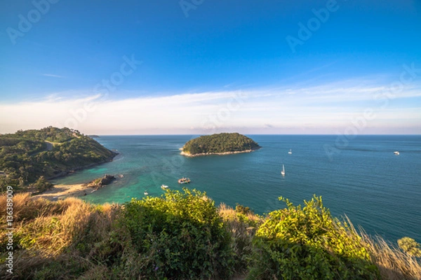 Obraz The wind blew the clouds scattered at the wind turbine.
grass flowers streaming in the wind
