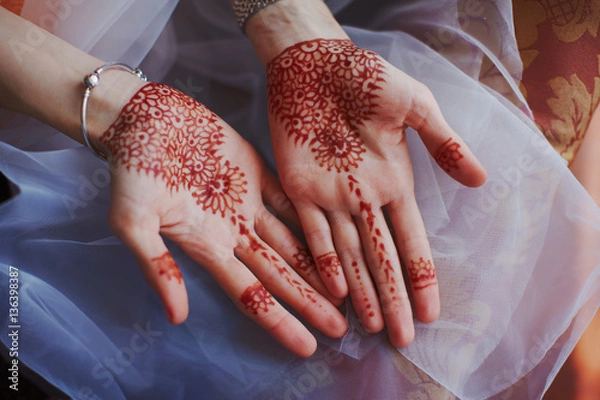 Fototapeta Beautiful henna patterns on hands of bride