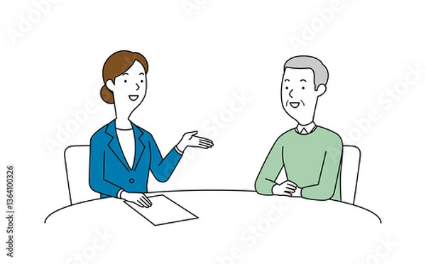 Fototapeta 女性の相談員にアドバイスを聞く高齢の男性