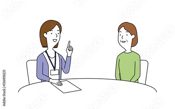 Obraz 女性の相談員にアドバイスを聞く高齢の女性