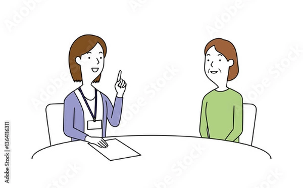 Obraz 女性の相談員にアドバイスを聞く高齢の女性