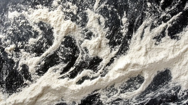 Obraz Flour spread across a grey surface in abstract patterns, creating an artistic presentation of baking essentials
