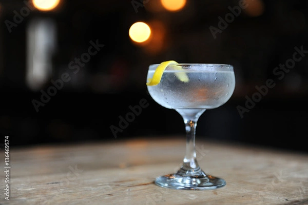 Fototapeta Martini with a twist on a bar