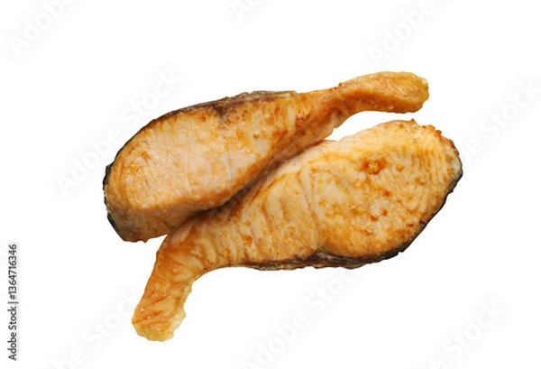 Fototapeta Isolated two pieces of fried salmon on a white background, top view fried sliced salmon meat.