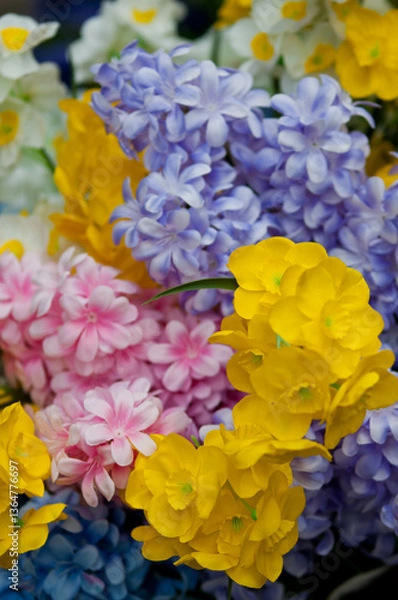 Fototapeta Colorful artificial flower arrangement with realistic details

