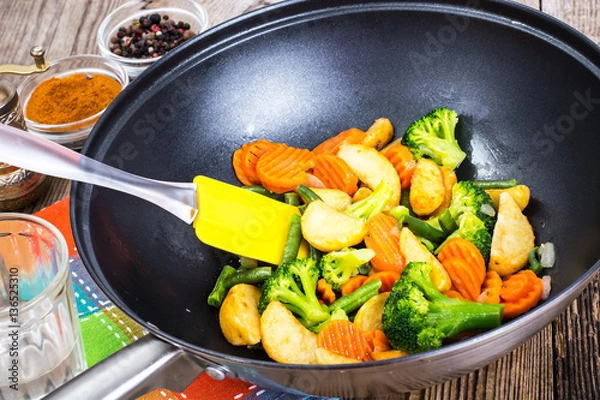 Fototapeta Wok with stewed vegetables