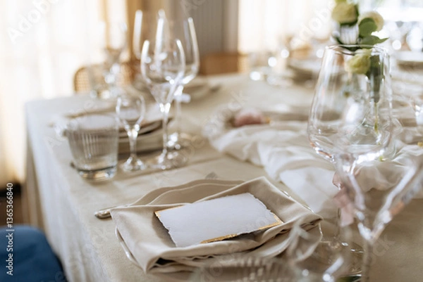 Obraz Decorated table with fresh flowers and serving with postcard. Celebrating a party in a restaurant