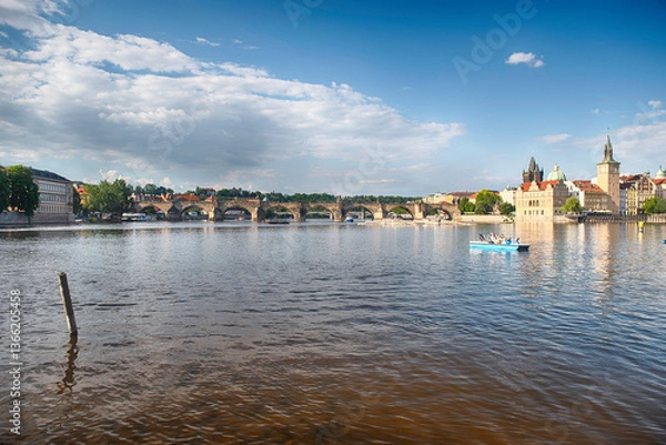 Fototapeta Charles Bridge crossing Vltava River in Prague, Czech Republic