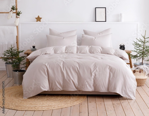 Obraz Scandinavian style bedroom with double bed, four pillows and duvet. Front view photo