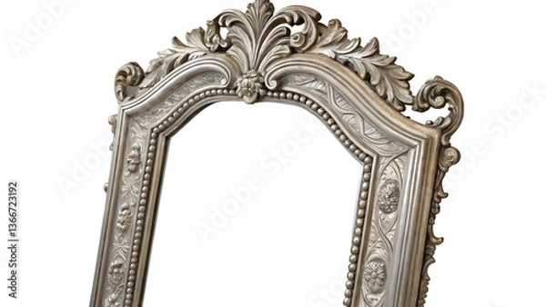 Fototapeta A detailed, close-up image showcases a highly ornate, silver-colored picture frame against a clean white background.