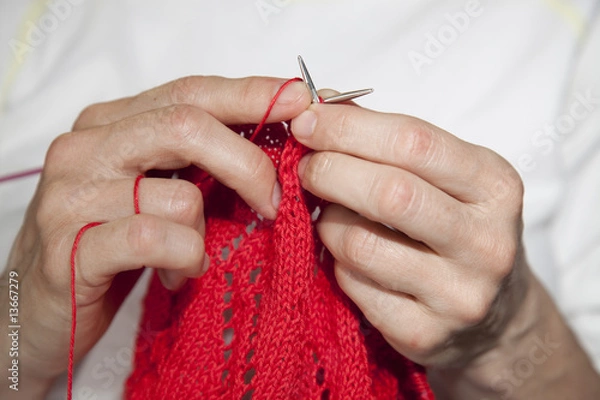 Obraz Two hands knitting
