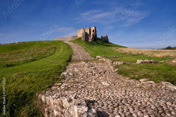 Fototapeta Duffus Castle, Elgin, Moray, Scotland is a ruined stone built motte and bailey fortress first constructed in the 12th century and finally abandoned in 1705.
