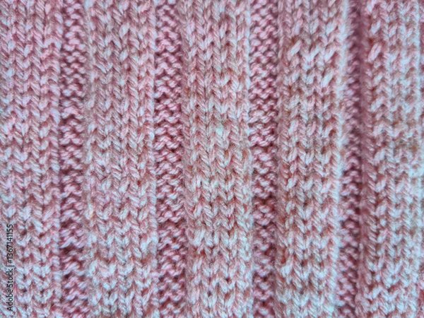 Obraz Pink knitting in progress. knitting needles and neat loops creating a textured pattern. a ball of soft wool yarn creating a cozy atmosphere. themes of handicrafts, creativity, knitting and hobbies.