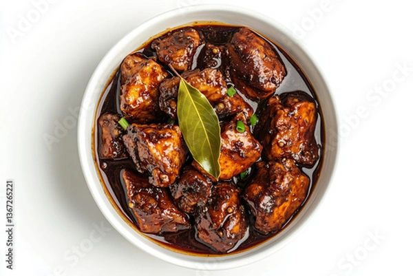 Fototapeta a bowl of stew with meat and a leaf