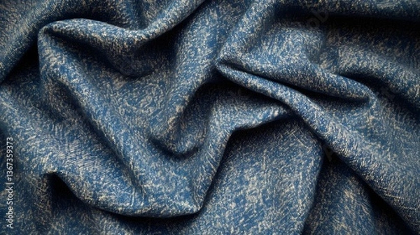 Fototapeta An abstract close up image of a deep indigo colored fabric with a crumpled wrinkled and folded texture creating a moody and gritty visual effect