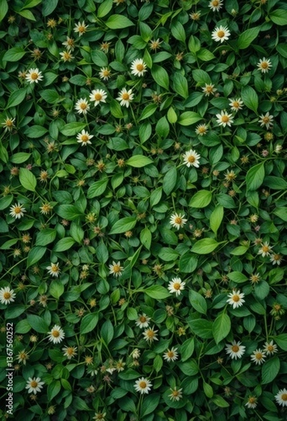 Fototapeta The background is a dense cover of elongated green leaves, among which small white and yellow flowers resembling daisies are evenly scattered. The stage radiates spring warmth and freshness.