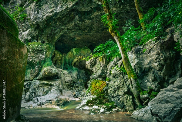 Obraz Mountain gorge with caves and little river from the portuguese touristic site of Olhos de Agua - Alviela - Alcanena