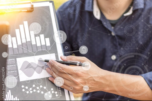 Fototapeta businessman hand working with new modern computer and business s