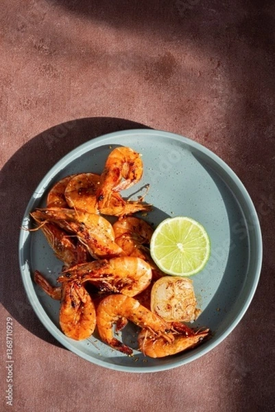 Obraz Marinated shrimp in a spicy grill with lime and garlic. Delicious fresh seafood, Mediterranean cuisine.
