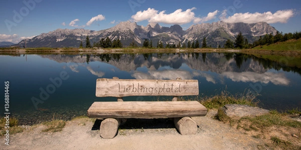 Fototapeta Scenic Wooden Bench at Astberg Lake with Stunning Wilder Kaiser Mountain Reflection, Tyrol, Austria