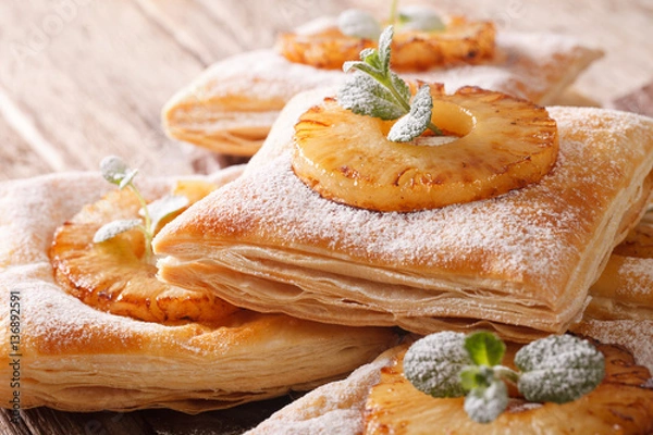 Fototapeta Delicious layer cake with pineapple macro. horizontal