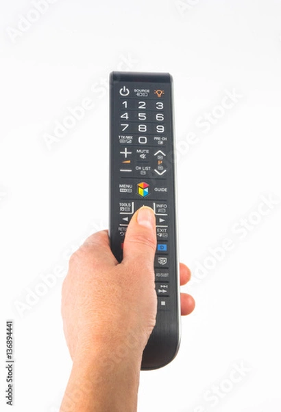 Obraz hand holding a remote control