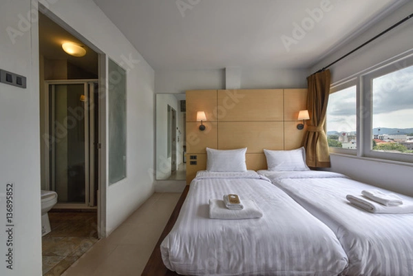 Fototapeta Interior of a hotel bedroom
