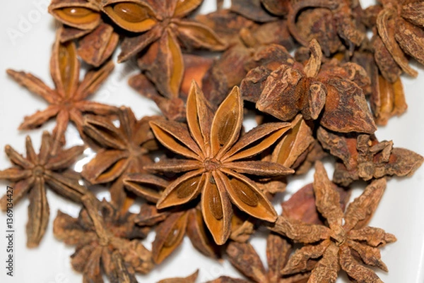 Fototapeta Illicium verum star anise eight horns with seeds for cooking and medicinal use horizontally