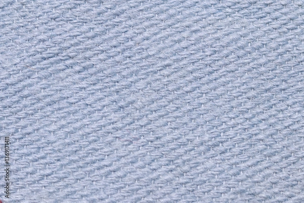 Fototapeta Pale blue cotton fabric wall material. Surface of cotton canvas fabric texture abstract background. High resolution photo.