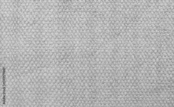 Obraz Grey felt material wall background. Surface of felted fabric texture abstract background in gray color. High resolution photo.

