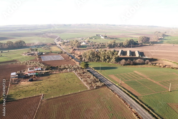 Fototapeta Aerial view of fields and farmland taken from a hot air balloon