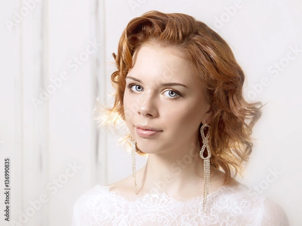 Obraz Portraits of a young bride on light background
