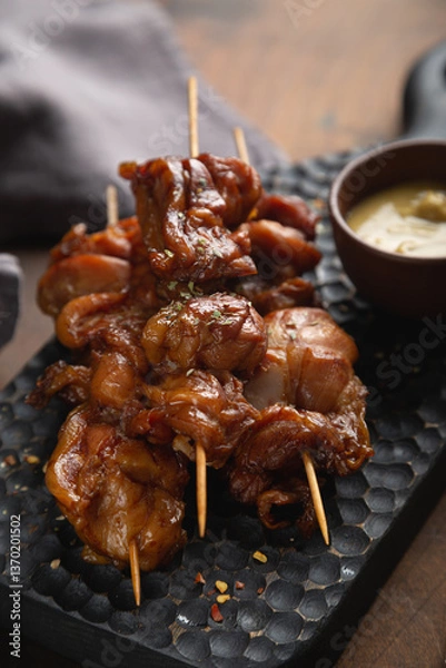 Obraz Smoked chicken pieces on a skewer