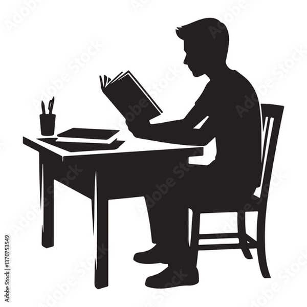 Fototapeta Focused Student Silhouette Studying and Reading Book at Desk
