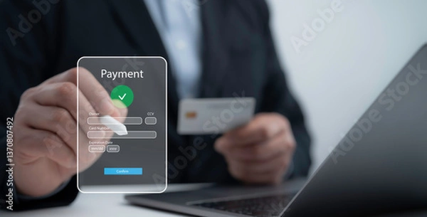 Fototapeta Businessman making an online payment with a credit card on a digital transaction interface symbolizing secure e-commerce and financial security