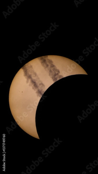 Obraz Solar Eclipse with airplane trails