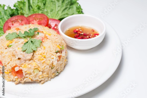 Fototapeta Pork fried rice with white background table