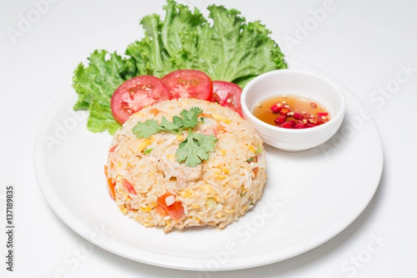 Fototapeta Pork fried rice with white background table