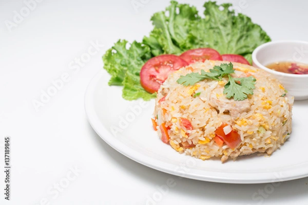 Fototapeta Pork fried rice with white background table