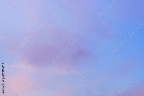 Fototapeta Twilight sky with effect of light in pastel pink, coral, orange, blue tones. Colorful sunset of soft clouds. Background