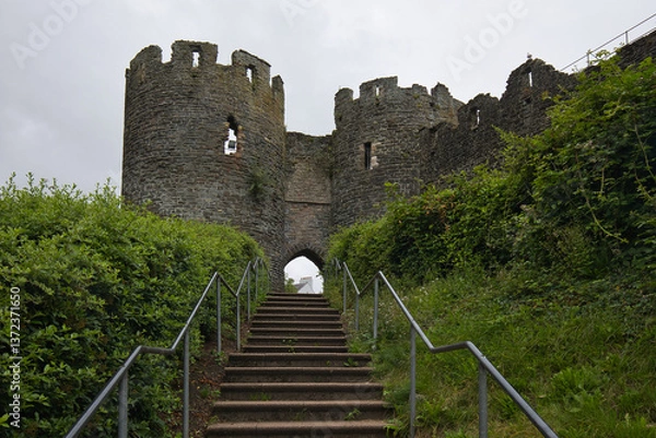Obraz A staircase leads up to the mill gate, one of the two gatehouses in the southern part of Conwy's town wall.