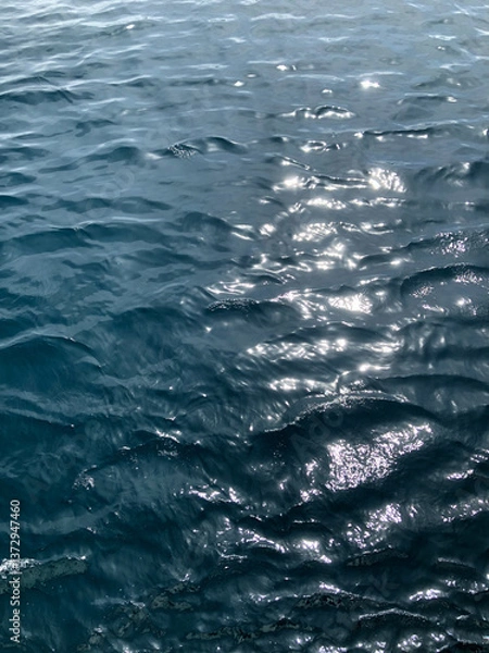 Obraz Sunlight sparkles over the rippling blue sea, capturing a moment of nature's pure elegance. Each wave reflects a new story of the ocean's life